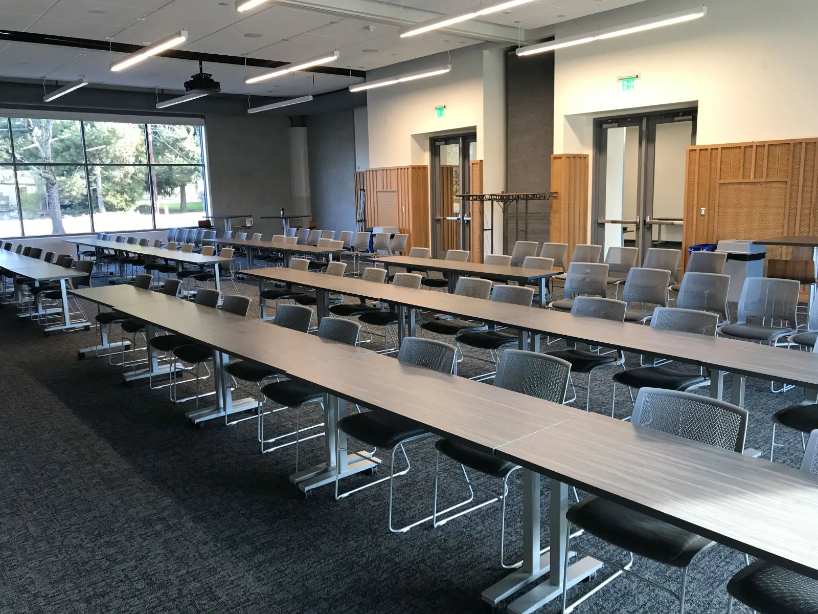 Rows of chairs and tables in Harmony Campus community room Rows of chairs and tables in Harmony Campus community room