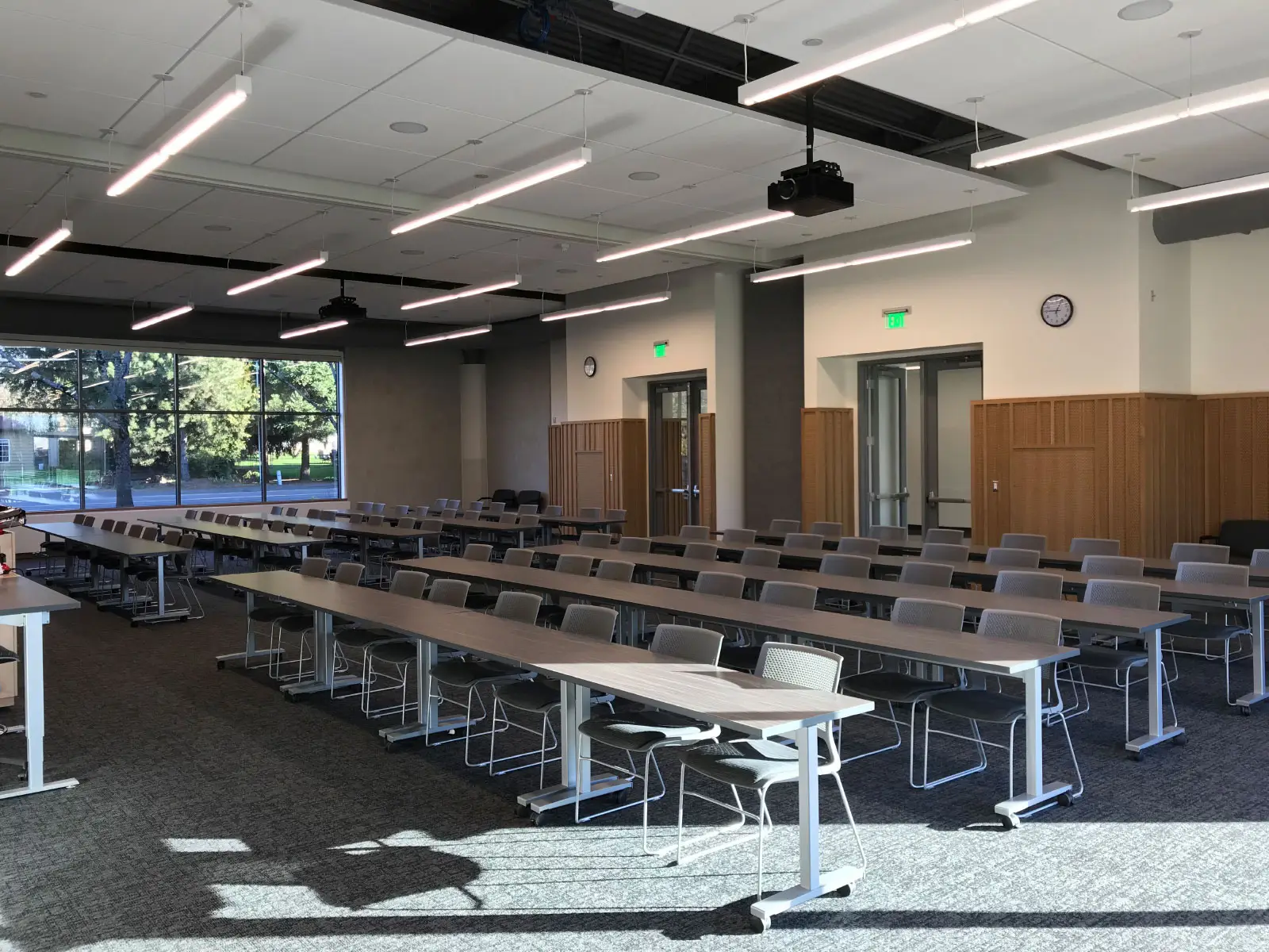 Rows of chairs and tables in Harmony campus community room