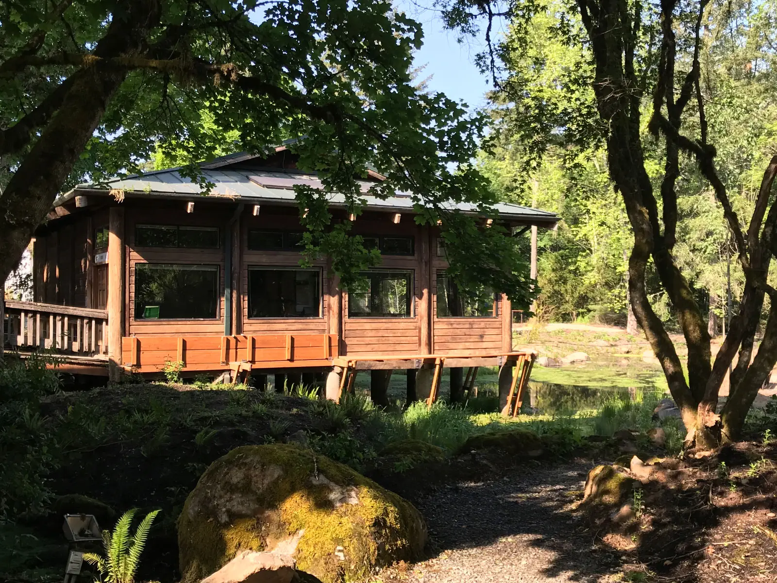 The Environmental Learning Center's Lakeside Hall, right next to a gravel path and beautiful trees The Environmental Learning Center's Lakeside Hall, right next to a gravel path and beautiful trees