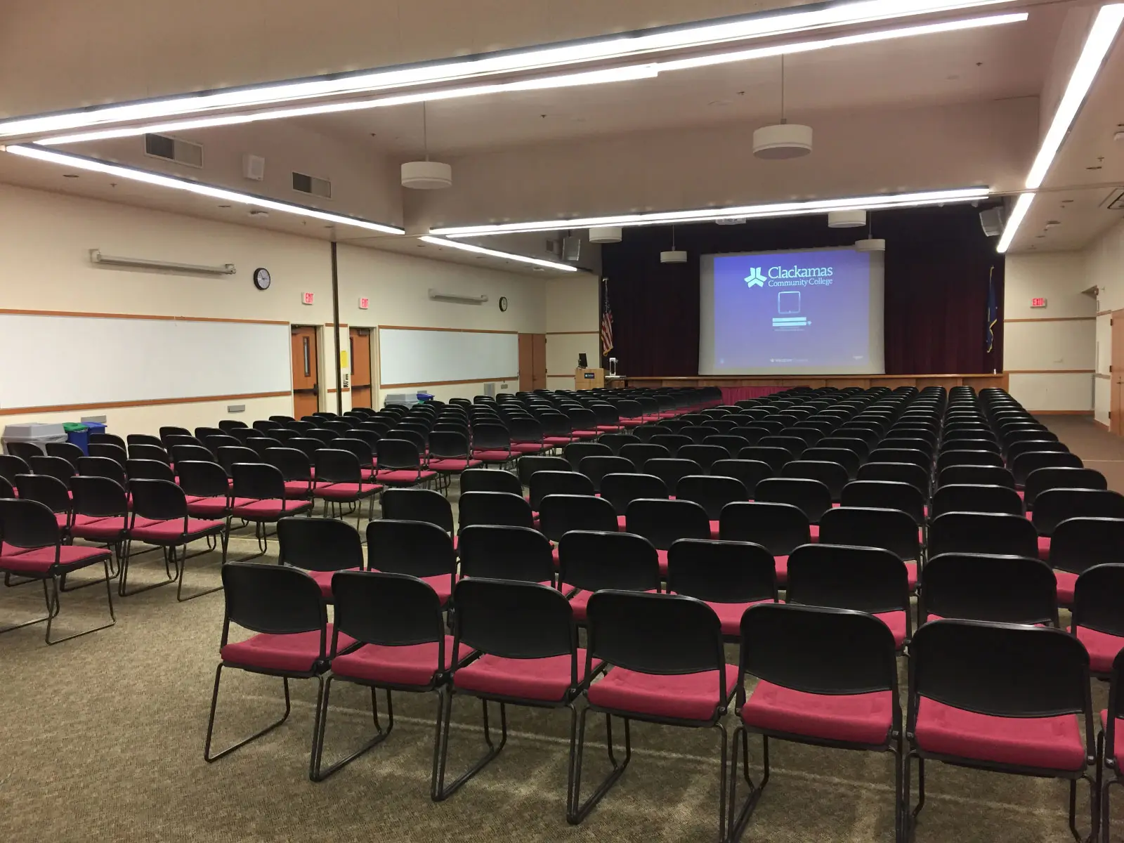 Neatly organized rows of chairs in front of a projector screen Gregory Forum on the Oregon City campus Neatly organized rows of chairs in front of a projector screen Gregory Forum on the Oregon City campus
