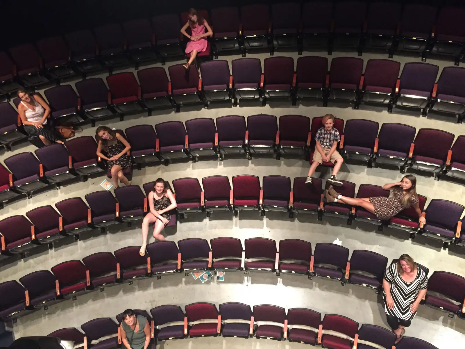 Overhead view of theatre students sitting in auditorium seats in a theater in the Oregon CIty campus Overhead view of theatre students sitting in auditorium seats in a theater in the Oregon CIty campus