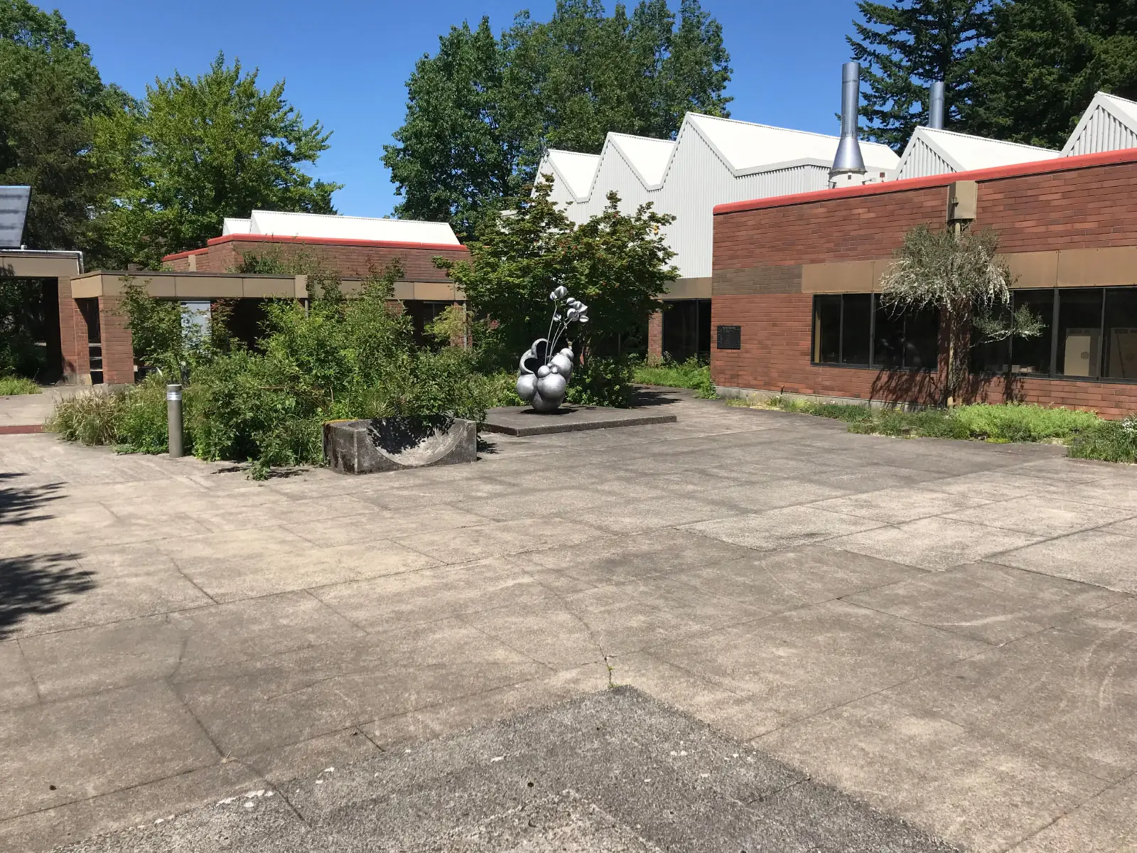 The outdoor statue garden area outside the Pauling Center at the Oregon City campus The outdoor statue garden area outside the Pauling Center at the Oregon City campus